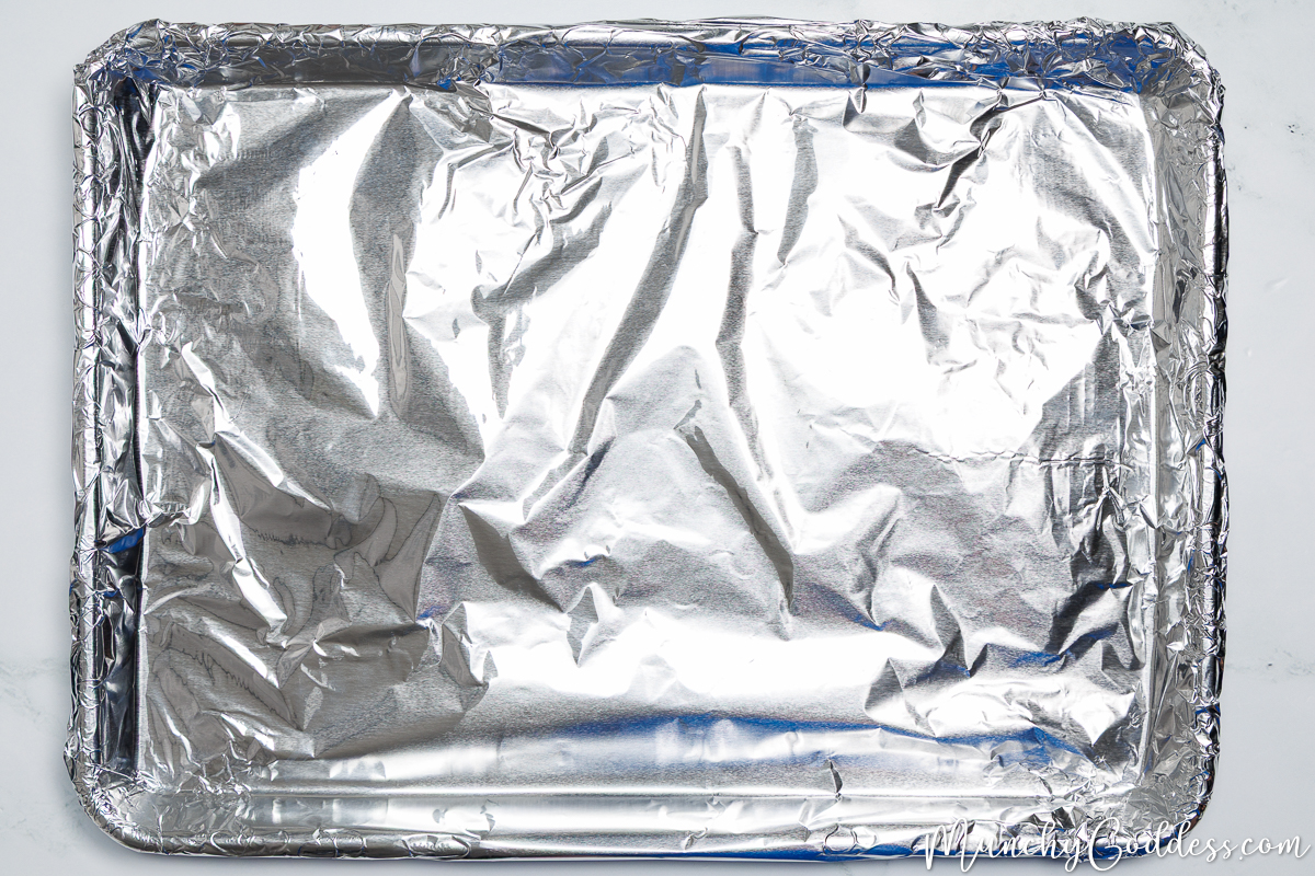 A baking sheet lined with aluminum foil.